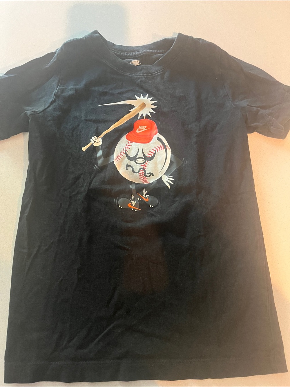 Nike Black Short-Sleeve Tee with Baseball Character Graphic
